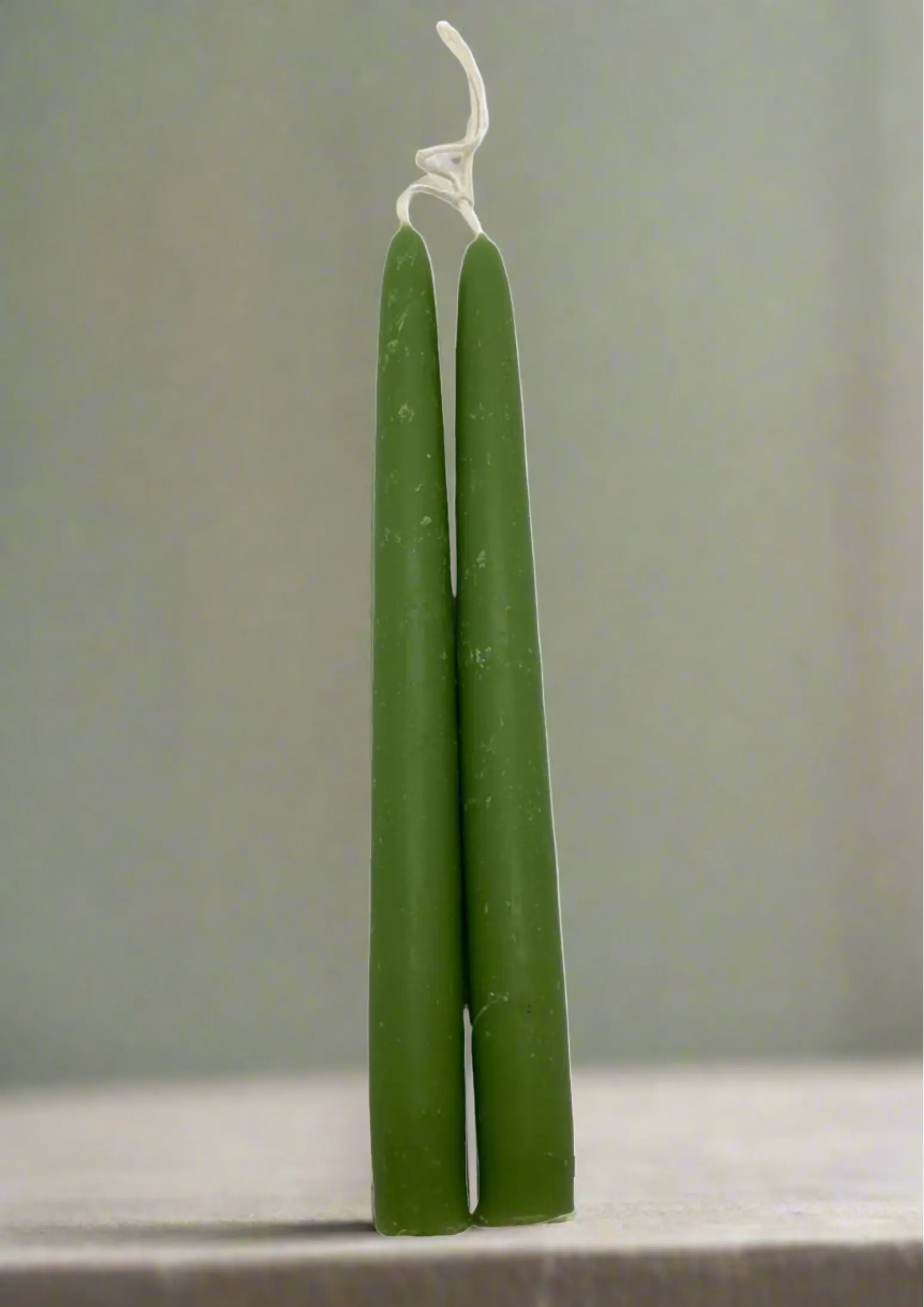 Pair of beeswax dipped green candles (OL)